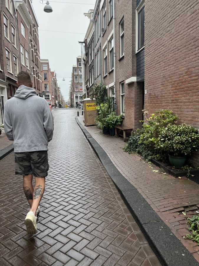 A walk along a narrow cobblestone street