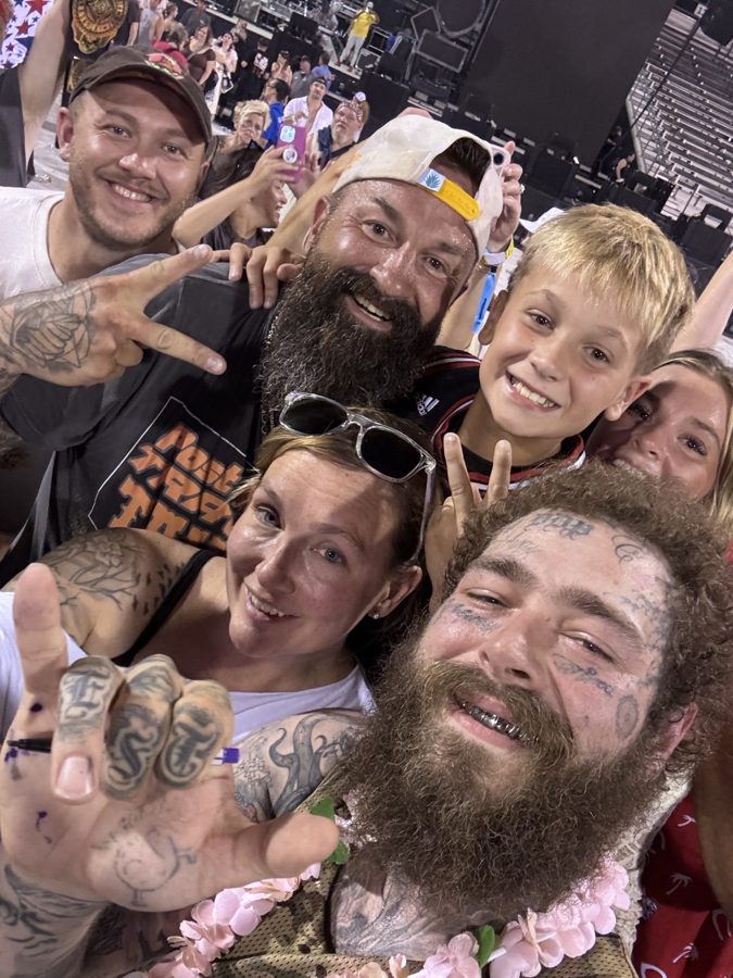 Friends celebrating together in a group selfie