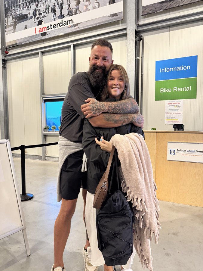 A hug and a smile in a passenger terminal